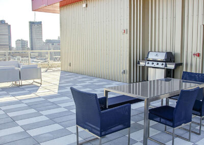 Crane Chinatown rooftop sundeck seating and grill station